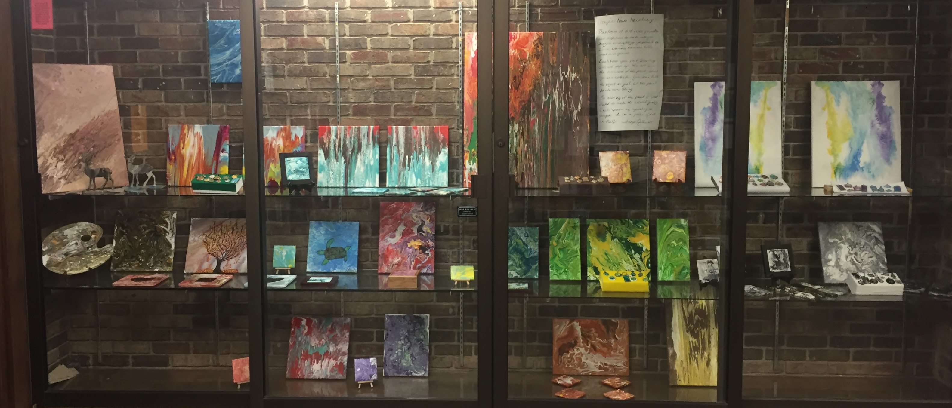 Library Display of Acrylic Pour Images